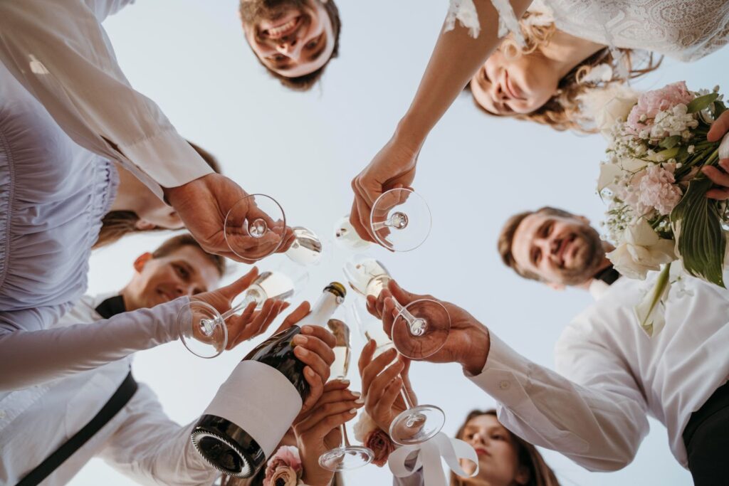 People celebrating a wedding with champagne