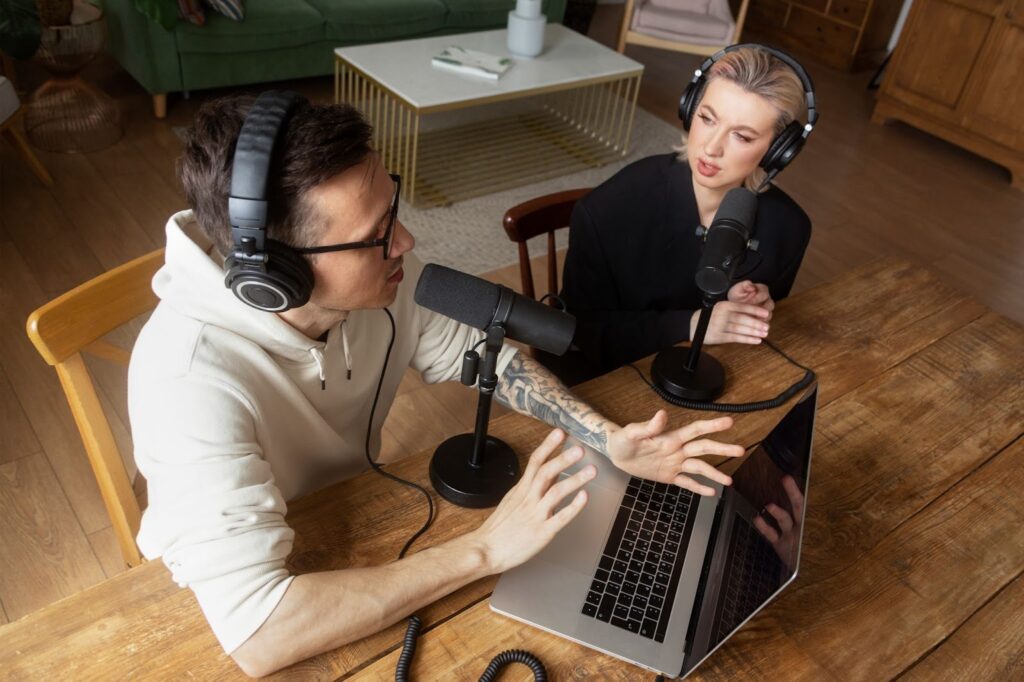 High angle of people recording podcast