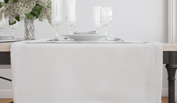 White table setting with flower vase