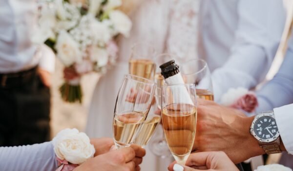 People celebrating a wedding with champagne
